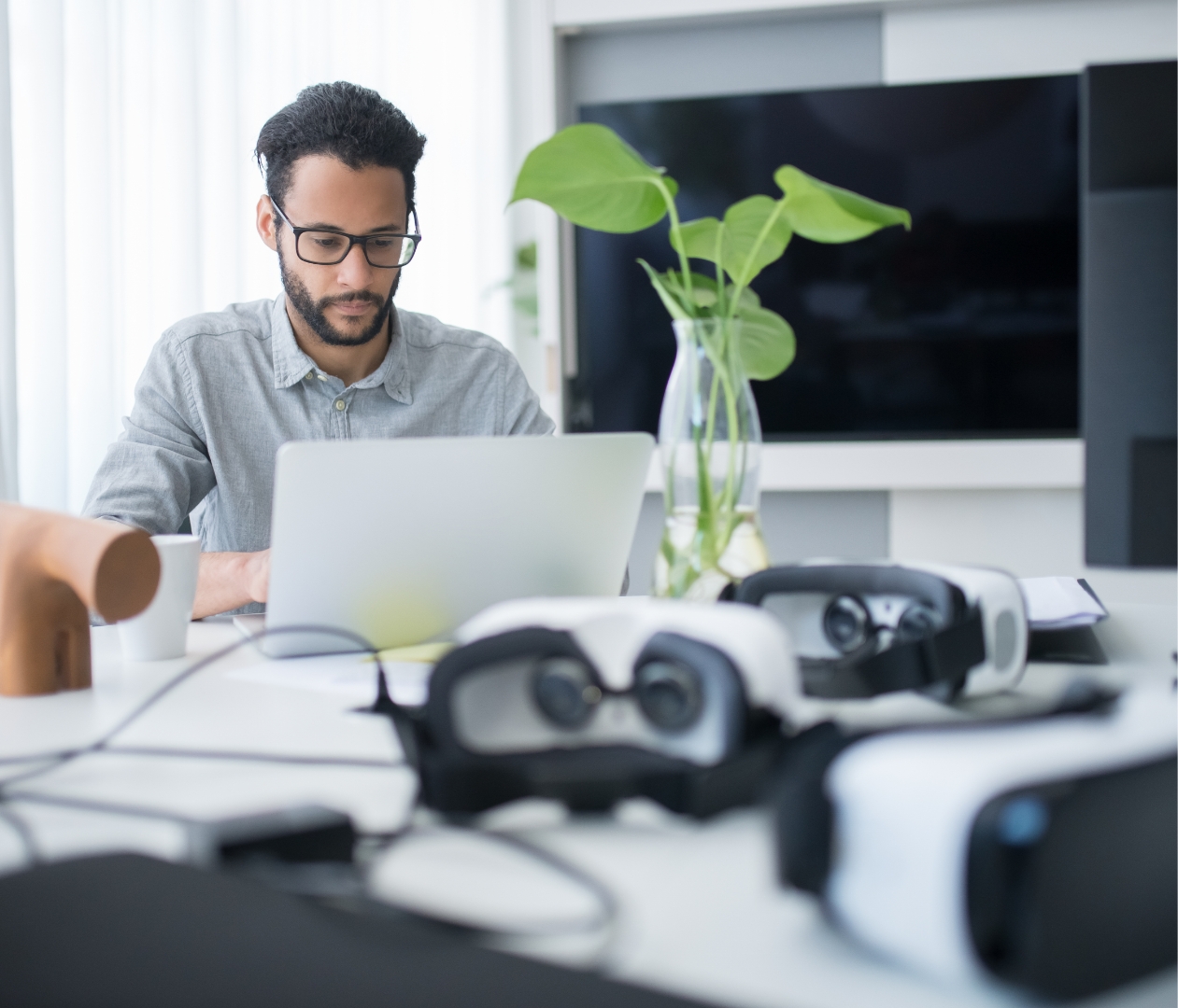 Man working with virtual reality goggles